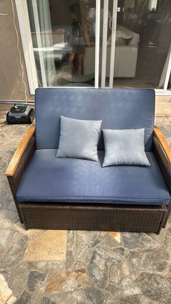 Outdoor couch with footstool
