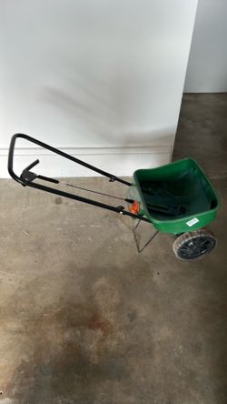 Spreader for garden or lawn