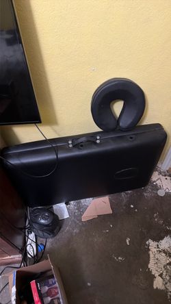Massage table with neck attachment