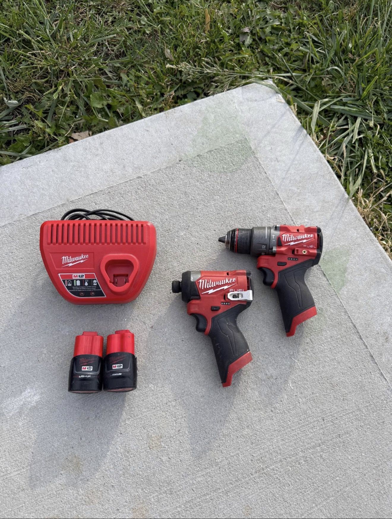 M12 Milwaukee Fuel impact driver & drill with (2) 1.5Ah battery and charger