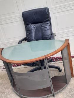 Computer desk and black leather chair