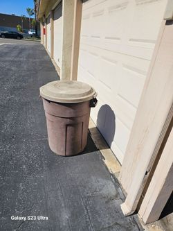 32 galon  33" H x 25"W garbage  can