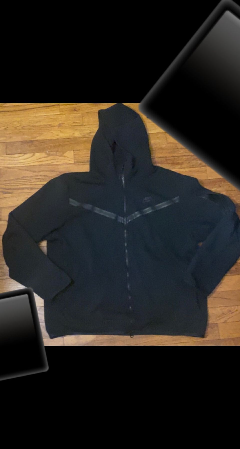 Black nike tech XL but fits like a large