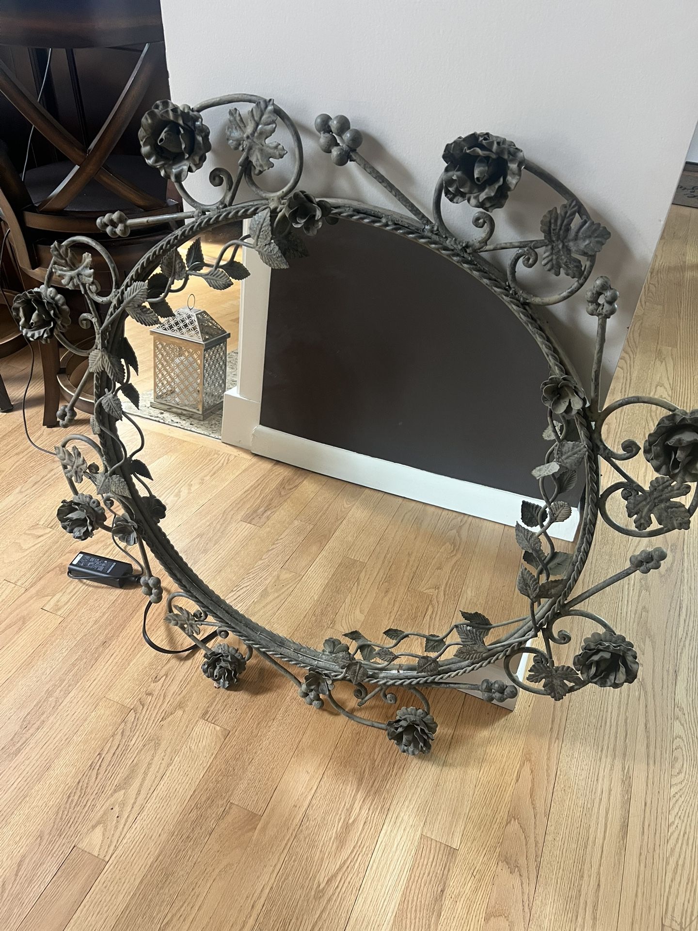 Beautiful moss green designer mirror made of iron with rose buds and pedals.