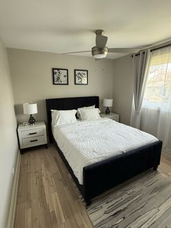 Queen bed with nightstands