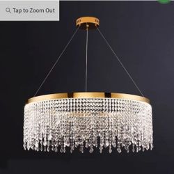 (New Factory Sealed) 
The Art of Lighting Gold & Crystal LED Chandelier with numerous sparkling crystals hanging in tiers. It's 24 inch wide and 12 in