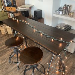 Ashley Wood Bar Table And Swivel Stools