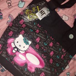 Hello Kitty x Hello Barbarian tote bag with pink skulls and lightning bolts on black background