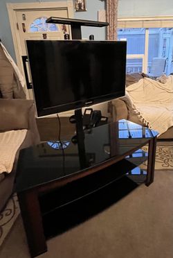 TV Center Stand + TV Included