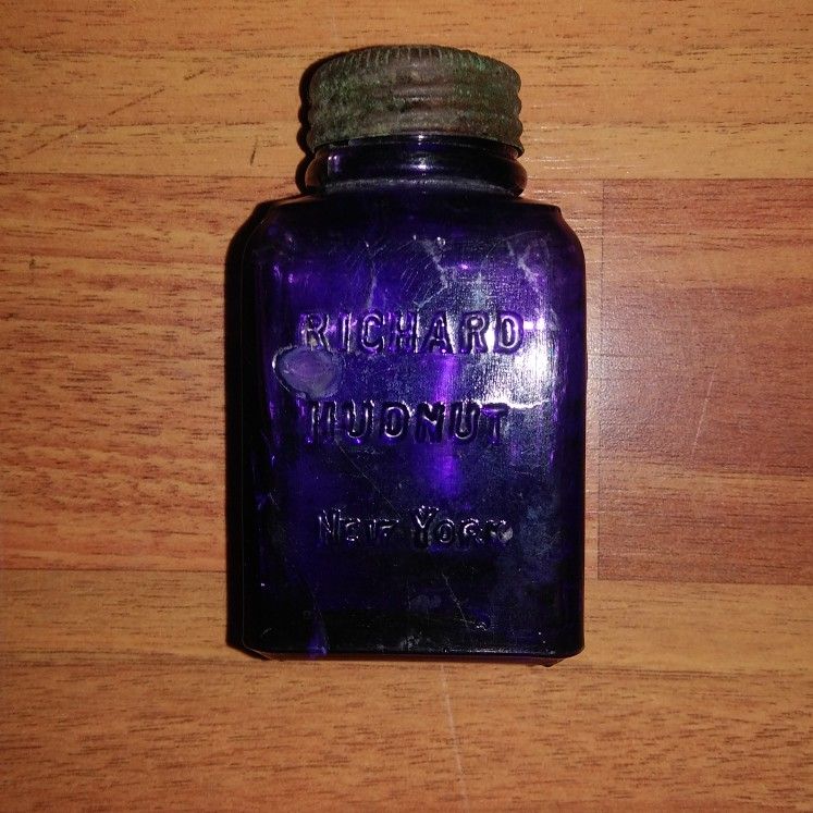 Antique Amethyst Bottle