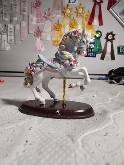 vintage 1987 Lenox porcelain carousel horse figurine from the "Ribbons & Bows" collection.