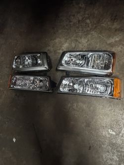 2004 Chevy Silverado 4 piece headlight combo