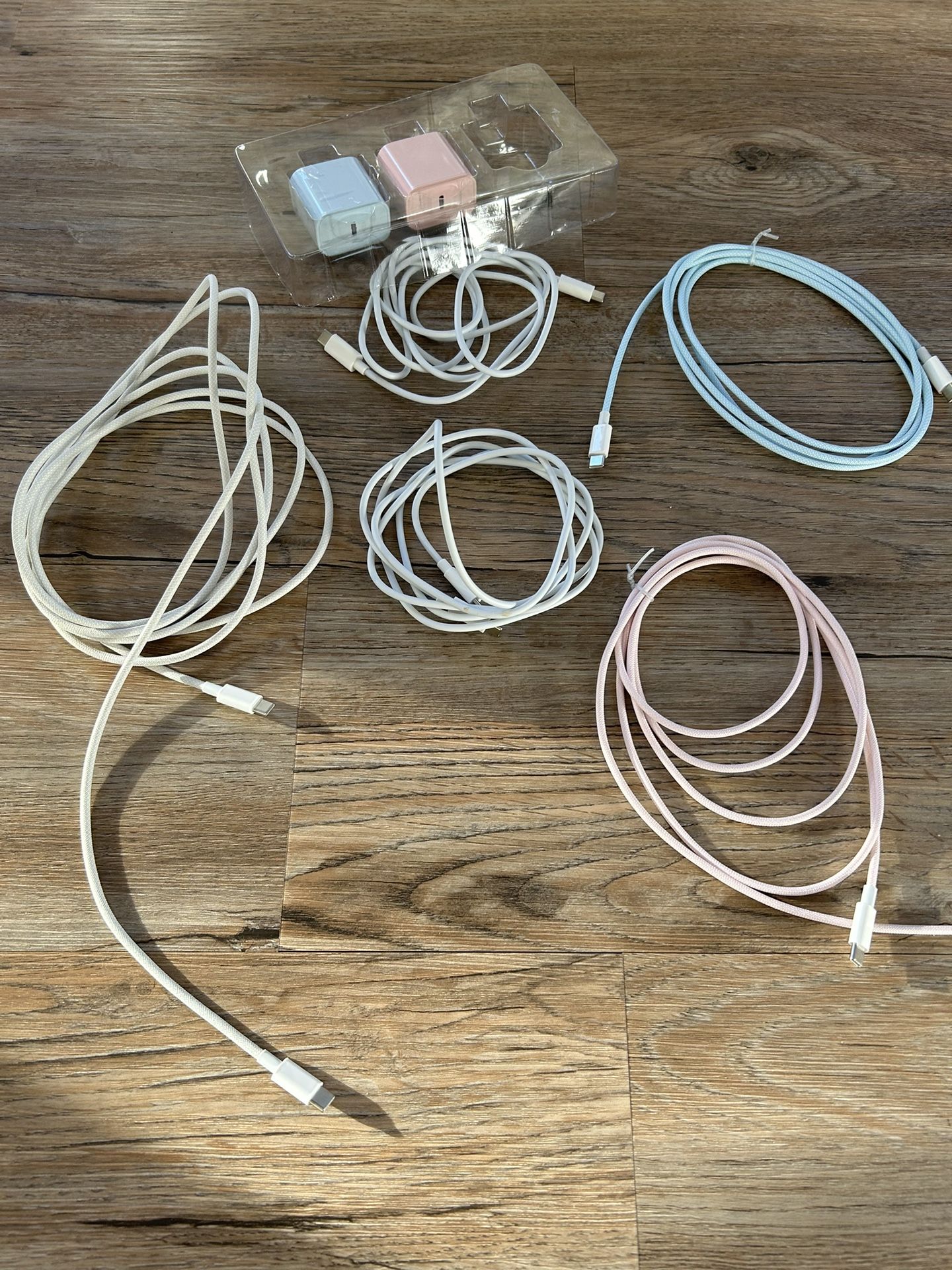 Assorted Charging Cords And Adapters
