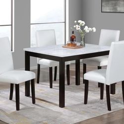 Dining Table And 4 Chairs  (Table: 48" x 36" x 30” H; Chair: 18" x 21" x 38"H)