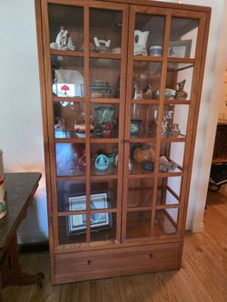 Cabinet w/ western pottery