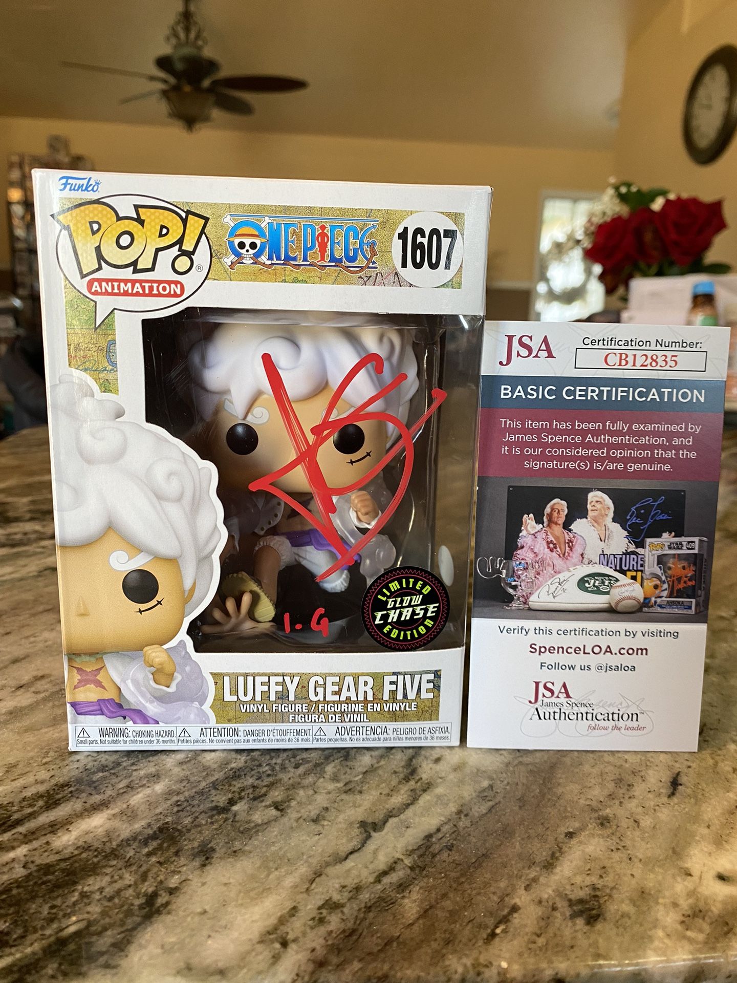 One Piece Luffy Gear Five Glow Chase #1607 signed Funko pop by Inaki Godoy JSA