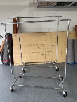 Two single clothing racks from ULine