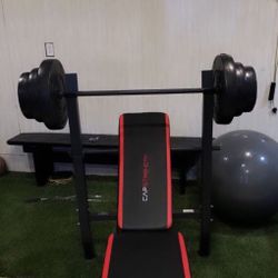 Gym Equipment Adjustable Bench press, barbell, leg developer and 100lbs of weight
