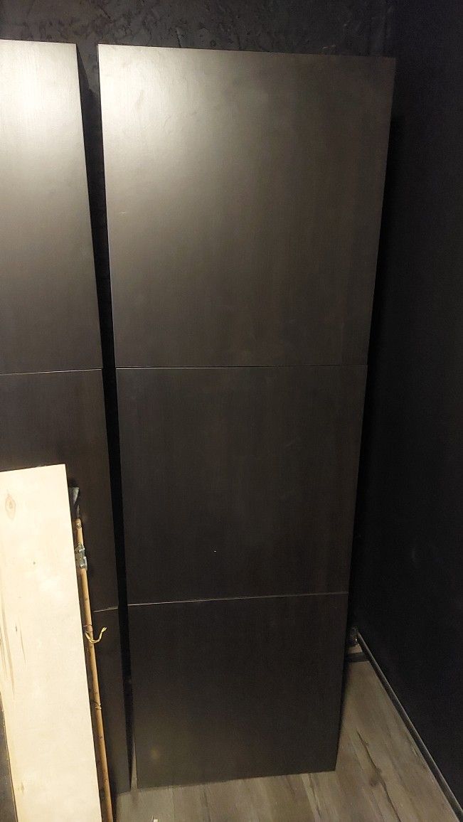 IKEA Black shelf unit with 3 doors, includes 4 shelves