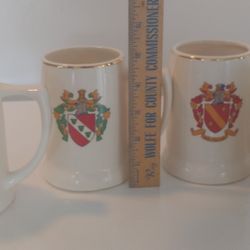 SET OF 4 STEINS WITH COAT OF ARMS