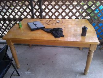 Wooden table with chairs