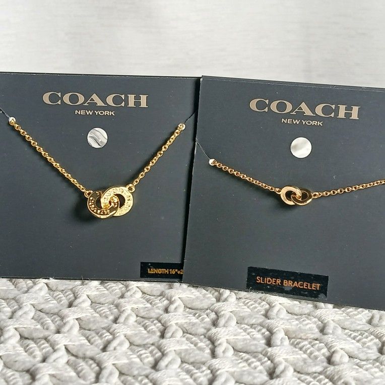 NWT COACH GOLD INTERLOCKING OPEN CIRCLE PENDANT NECKLACE AND SLIDER BRACELET SET