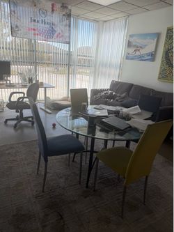 Glass table with 4 elegant chairs ($65 for all)