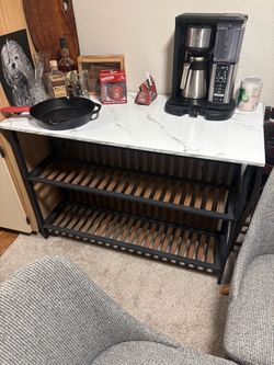 Kitchen island with barstool seating and storage