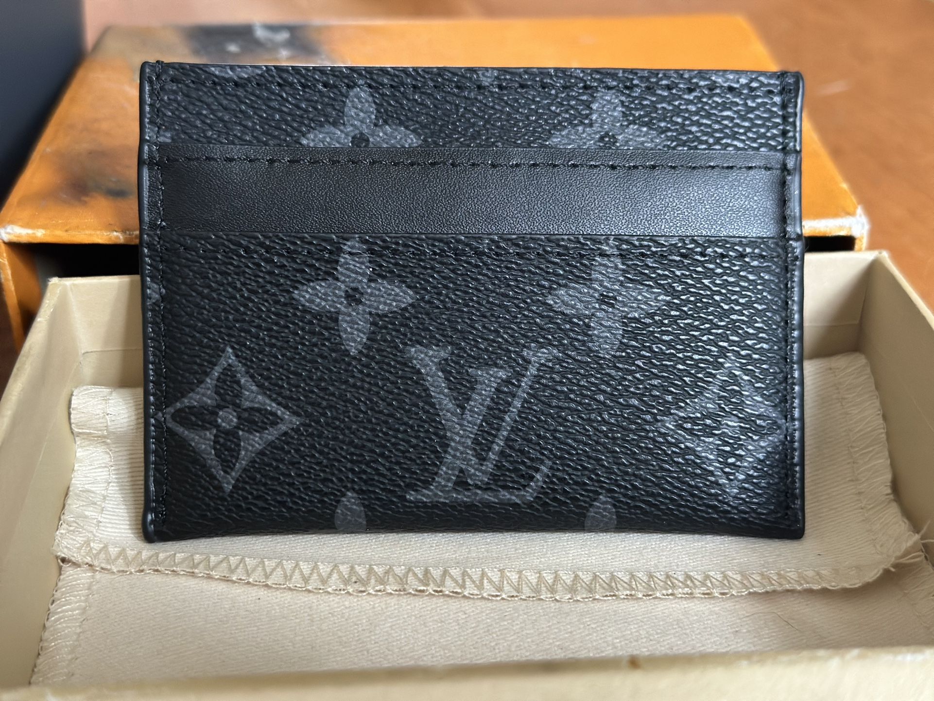 Louis Vuitton Double Card Holder.