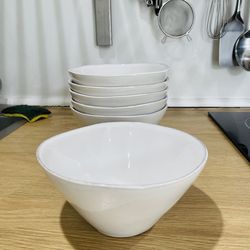 White Crate & Barrel + gray bowls, 12 items total.