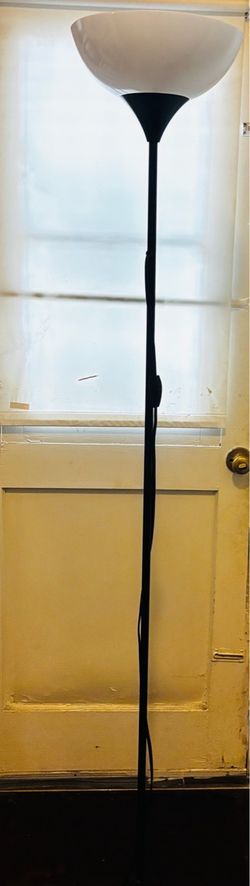 IKEA Black Floor Lamp Black metal torchiere floor lamp with a white bowl shade and round base.        69” Tall