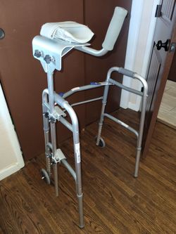 2 gently used walkers and 1 arm platform