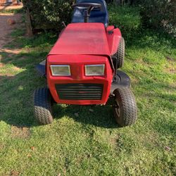 Older Lawn Tractor  Flip Or Parts
