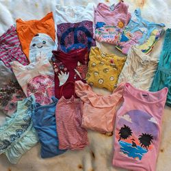 Set of 16 young girls size 7/8- 10/12 tee shirts and tank tops.

