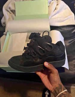 Lanvin curbs