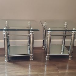 2 glass and metal side tables
