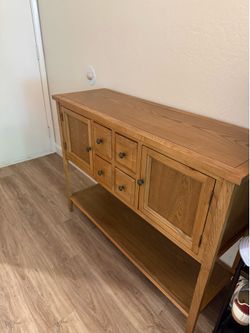 Furniture with 6 drawers.  Color: light brown , material : wood.