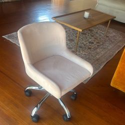 baby pink rolling chair