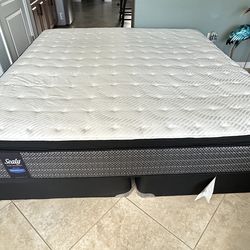 King size Sealy pillow top mattress with box springs