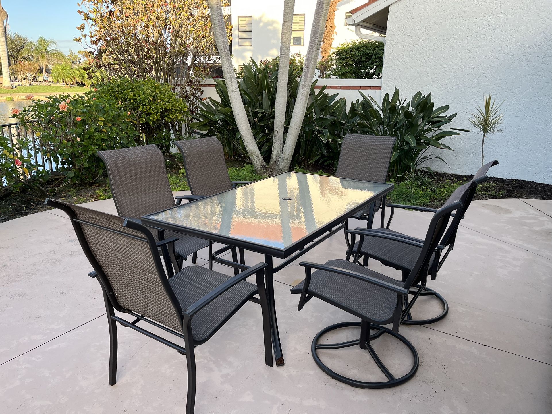 Seven Piece Glass Top Dining Patio Set - Table & Chairs!