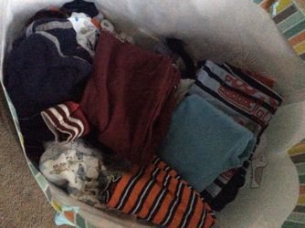 lots of baby boy clothes