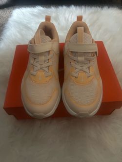 New in box peach colored Nikes size 3