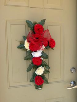 Red and white cross flower decoration