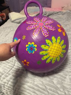 Bouncy ball with handle