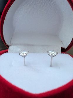 Mossinite .5 carats each silver