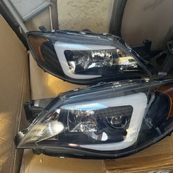 2008-2014 WRX/STI aftermarket headlights. lightly used