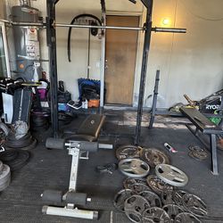 Smith machine/bench press with 295lbs of Olympic weights