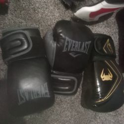 2 Pairs Of Boxing Gloves And Head Gear 