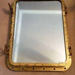 Authentic ship port hole mirror.