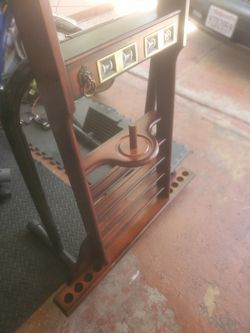 Q stick holder for pool table